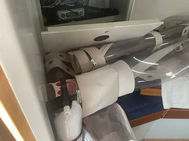 Slide: The Image of Fire extinguisher and equipment inside a 1981 SISU 26 boat cabin. - 8