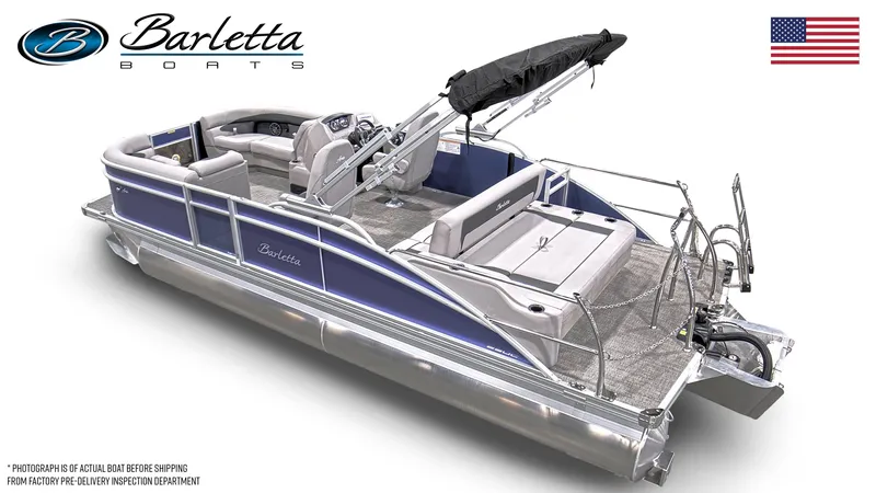 Slide: The Image of 2025 Barletta ARIA 22UC pontoon boat in showroom, featuring sleek blue design. - 2