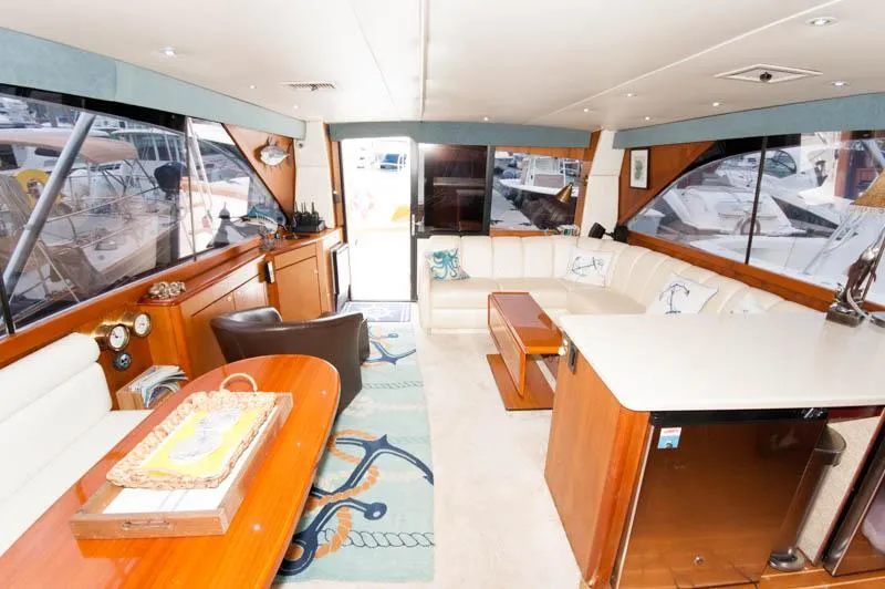 Slide: The Image of Luxurious interior of a 1997 Ocean Yachts 53 Super Sport with elegant seating and decor. - 20