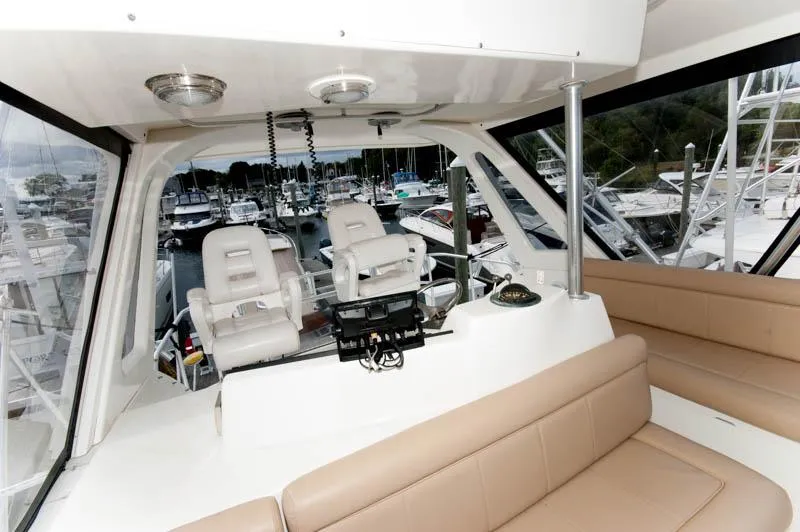 Slide: The Image of Interior of 1997 Ocean Yachts 53 Super Sport with helm and seating area. - 25