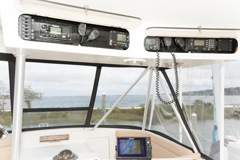 Slide: The Image of Interior view of 1997 Ocean Yachts 53 Super Sport cockpit with navigation equipment. - 26