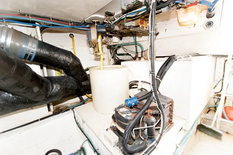 Slide: The Image of Engine room of 1997 Ocean Yachts 53 Super Sport with visible mechanical components. - 37