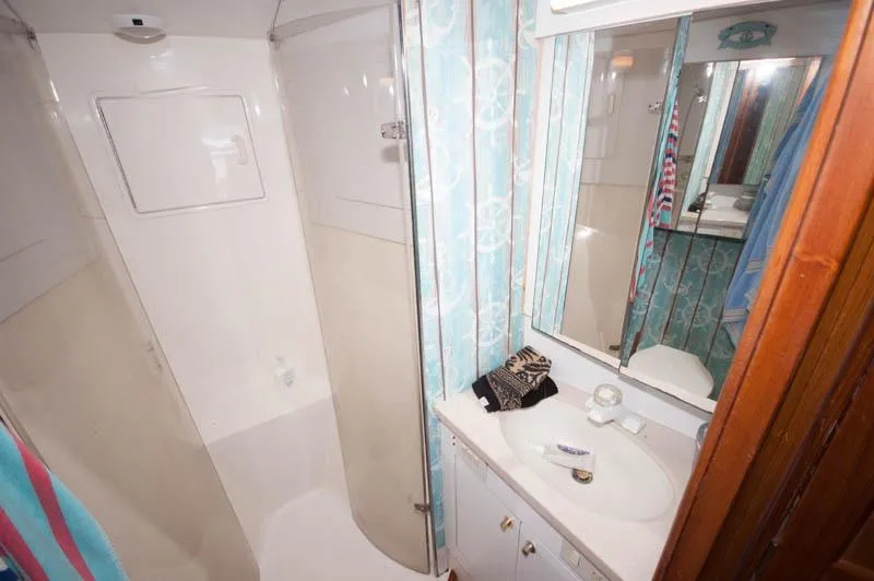 Slide: The Image of Bathroom interior of 1997 Ocean Yachts 53 Super Sport with shower and vanity. - 7