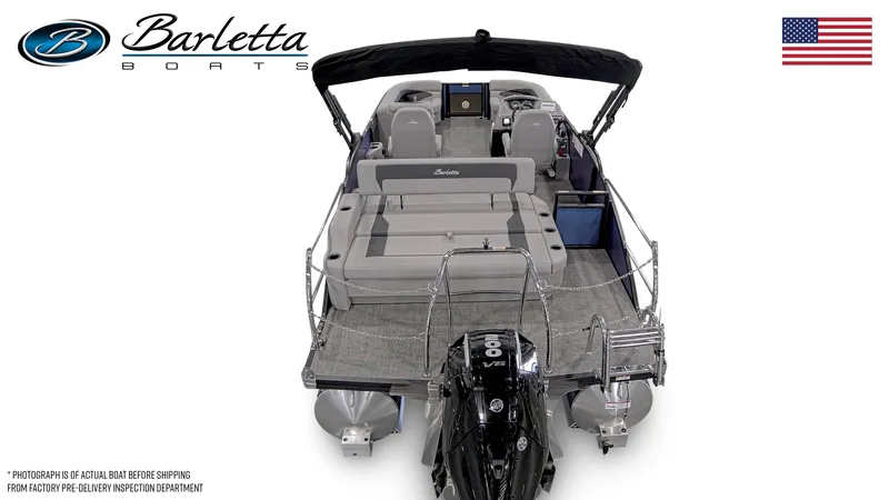 Slide: The Image of 2025 Barletta ARIA 22UC pontoon boat, rear view with seating and motor, American flag. - 3