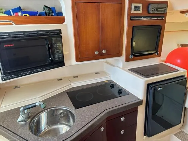 Slide: The Image of Grady White 33 - Galley - 8