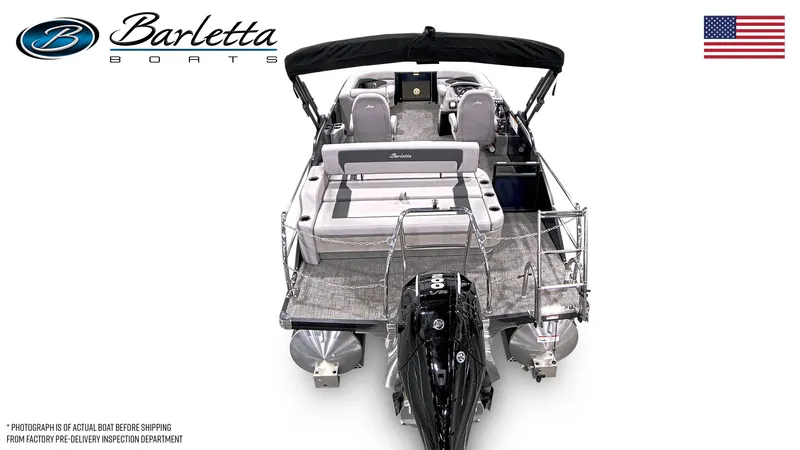 Slide: The Image of 2025 Barletta ARIA 22UC pontoon boat, rear view, with seating and motor, American flag. - 3