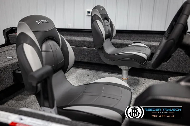 Slide: The Image of 2025 Lund Adventure SS boat interior with sleek, modern seating design. - 13