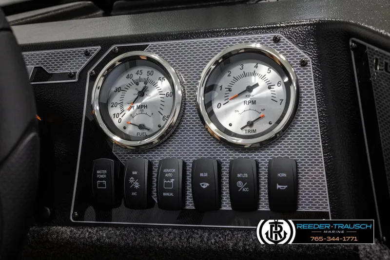 Slide: The Image of Dashboard of 2025 Lund Adventure SS boat with speedometer and RPM gauges. - 21