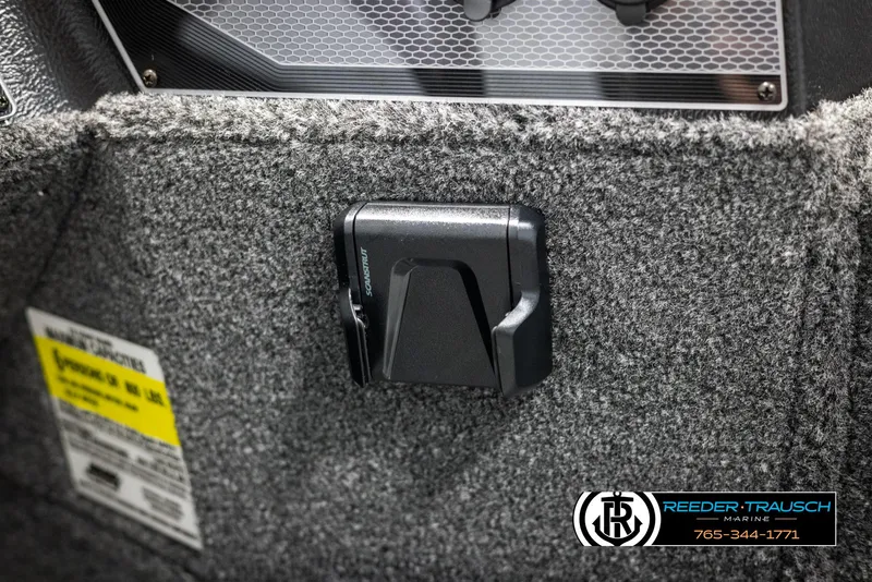 Slide: The Image of Interior of 2025 Lund Adventure SS boat with carpeted panel and mounted accessory. - 22