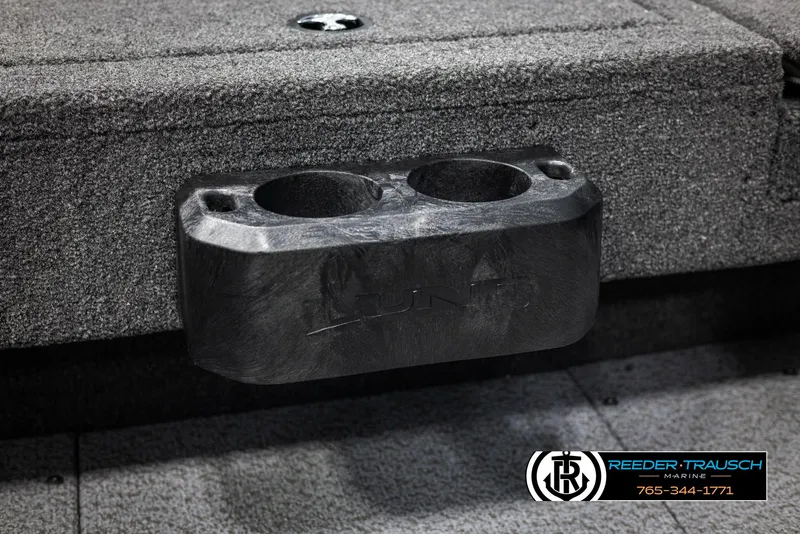 Slide: The Image of 2025 Lund Adventure SS boat cup holder on carpeted surface, Reeder-Trausch Marine branding. - 28