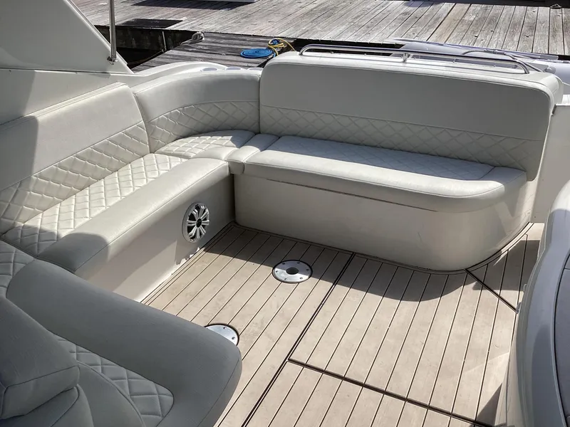 Slide: The Image of Luxurious seating area on a 2001 Formula 370 Super Sport boat. - 10