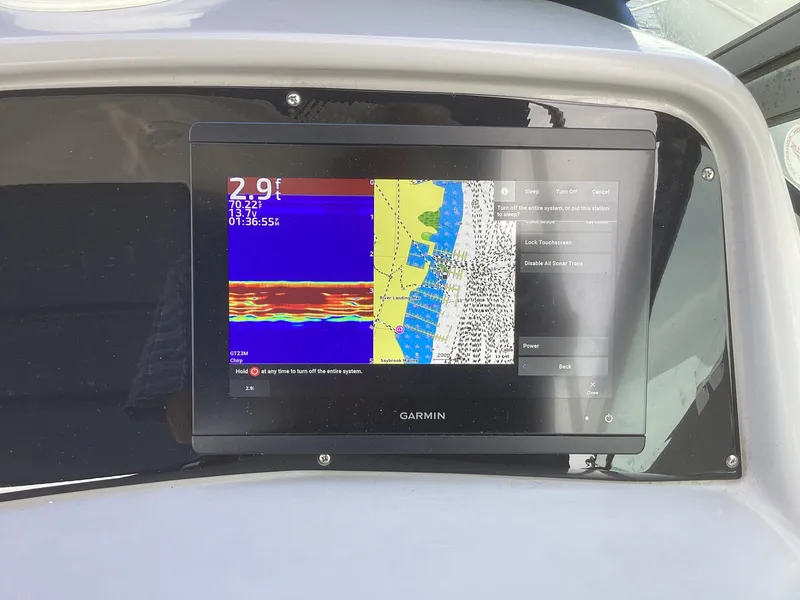 Slide: The Image of Garmin navigation display on 2001 Formula 370 Super Sport boat dashboard. - 13