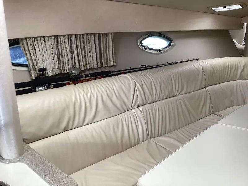 Slide: The Image of Interior of 2001 Formula 370 Super Sport boat with beige leather seating. - 16