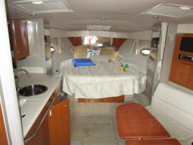 Slide: The Image of Interior of 2006 Formula 34 PC yacht with cozy bed and kitchenette. - 11