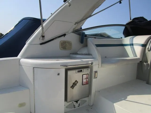 Slide: The Image of 2006 Formula 34 PC yacht interior with seating and mini fridge. - 6