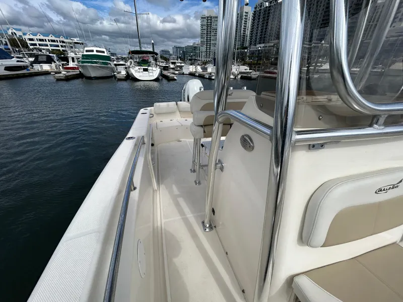 Slide: The Image of 2021 Bulls Bay 230 Center Console boat docked in a marina. - 20