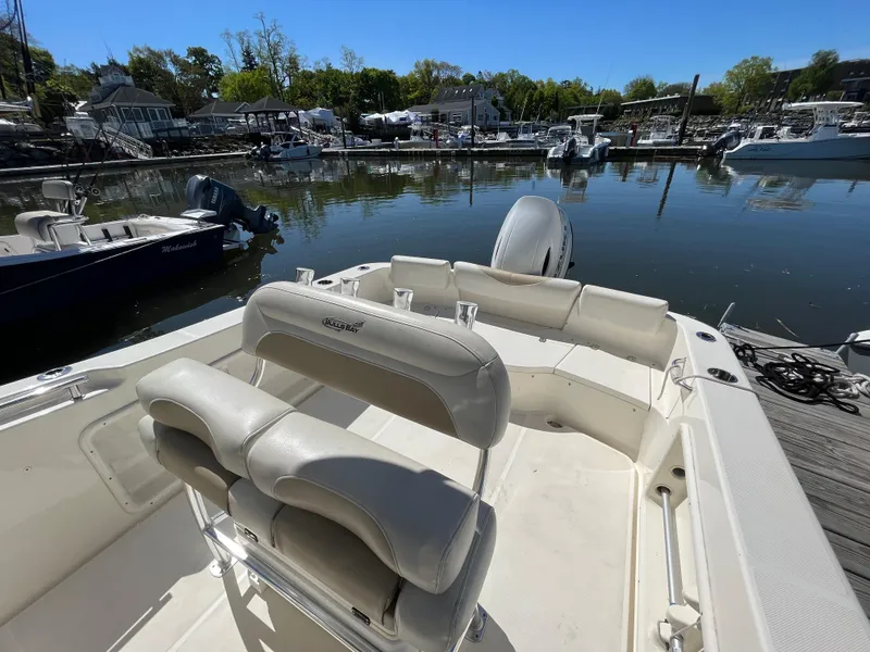 Slide: The Image of 2021 Bulls Bay 230 Center Console boat docked in a marina. - 24
