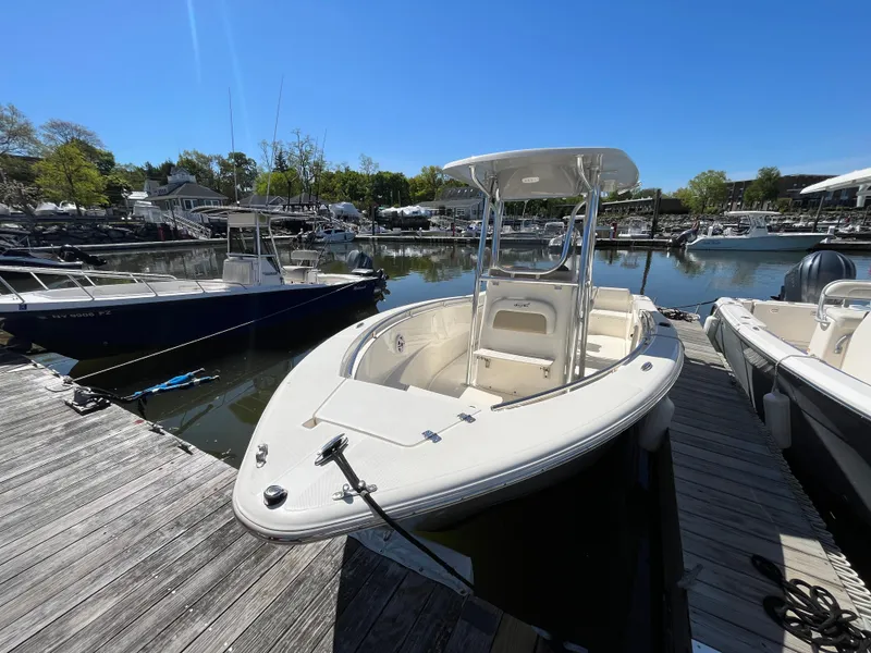 Slide: The Image of 2021 Bulls Bay 230 Center Console boat docked at marina. - 3