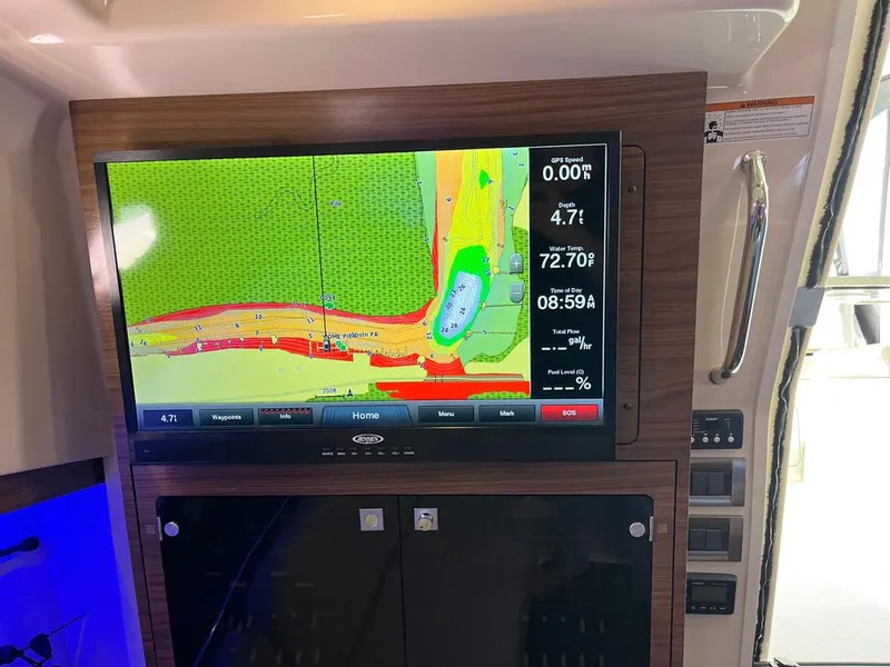 Slide: The Image of Navigation display on 2017 Boston Whaler 345 Conquest boat, showing map and data. - 13