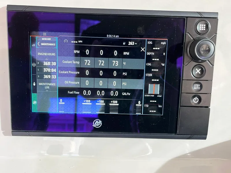 Slide: The Image of Display screen on 2017 Boston Whaler 345 Conquest showing engine metrics and controls. - 14