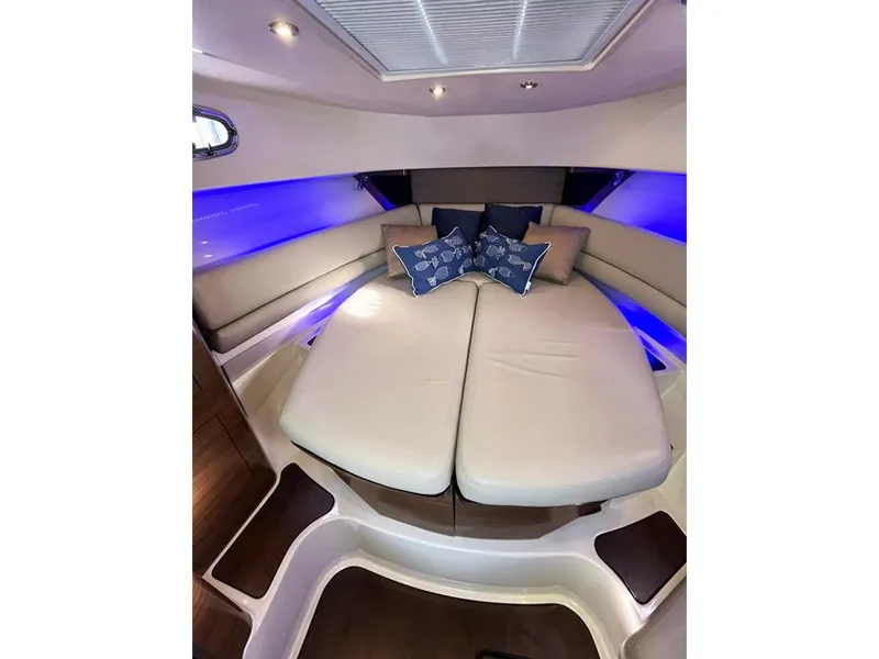 Slide: The Image of Luxurious interior of 2017 Boston Whaler 345 Conquest with plush seating and ambient lighting. - 20