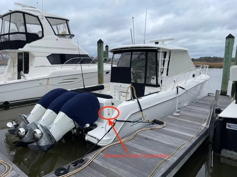 Slide: The Image of 2017 Boston Whaler 345 Conquest docked with triple outboard engines. - 3