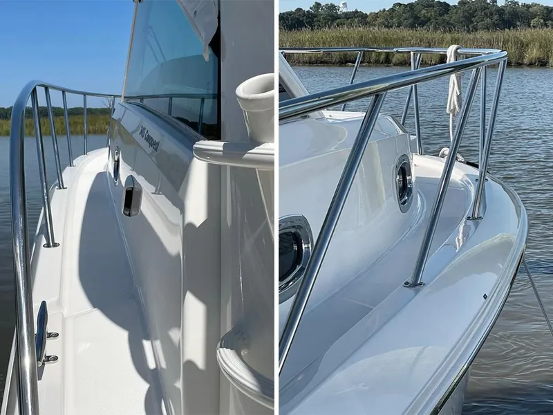 Slide: The Image of 2017 Boston Whaler 345 Conquest boat, sleek design, stainless steel railings, docked on calm water. - 9