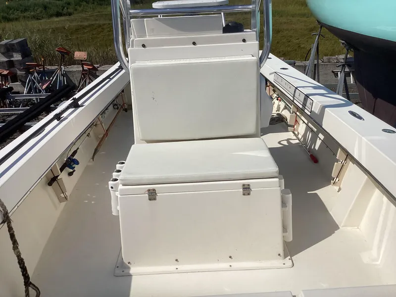 Slide: The Image of 2007 Jones Brothers 23 Cape Fisherman boat interior with seating and storage. - 13