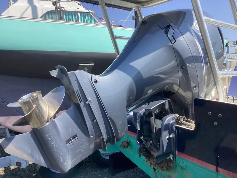Slide: The Image of Outboard motor of a 2007 Jones Brothers 23 Cape Fisherman boat. - 15