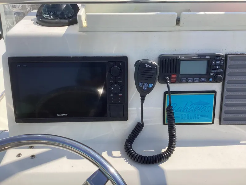 Slide: The Image of Dashboard of 2007 Jones Brothers 23 Cape Fisherman with Garmin GPS and Icom radio. - 6