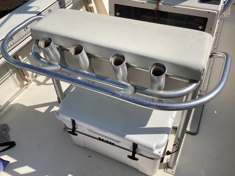 Slide: The Image of Boat seating with rod holders on a 2007 Jones Brothers 23 Cape Fisherman. - 7