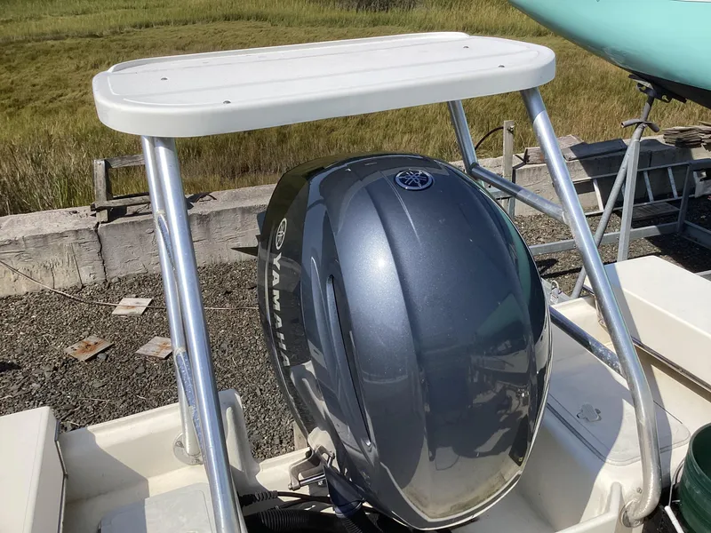 Slide: The Image of 2007 Jones Brothers 23 Cape Fisherman boat with Yamaha outboard motor. - 9