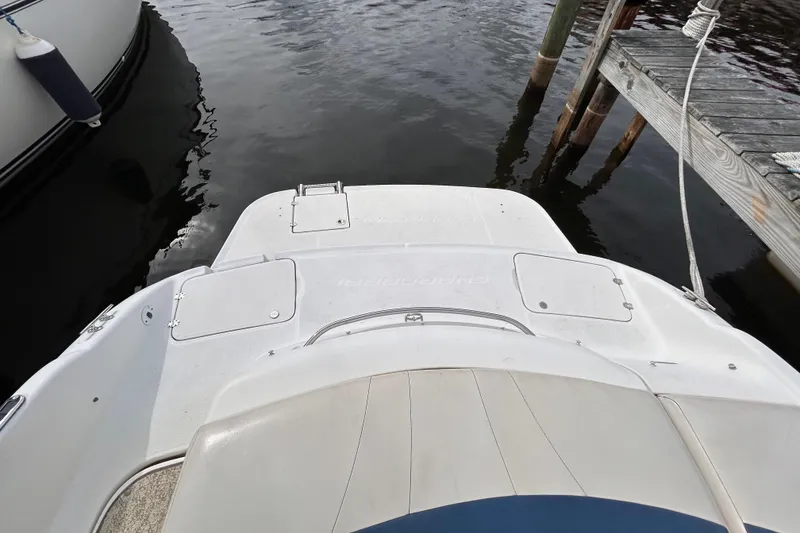 Slide: The Image of 2002 Chaparral 220 SSi boat stern view at dockside. - 13