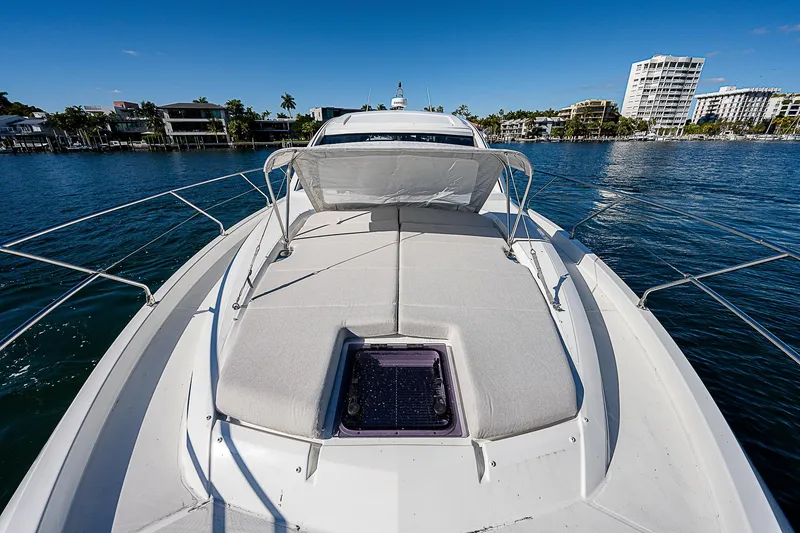 Slide: The Image of 2022 Beneteau Gran Turismo 45 yacht on calm water, sunny day. - 25