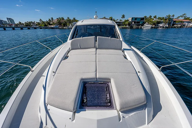 Slide: The Image of 2022 Beneteau Gran Turismo 45 yacht with spacious sunbathing deck on calm waters. - 26