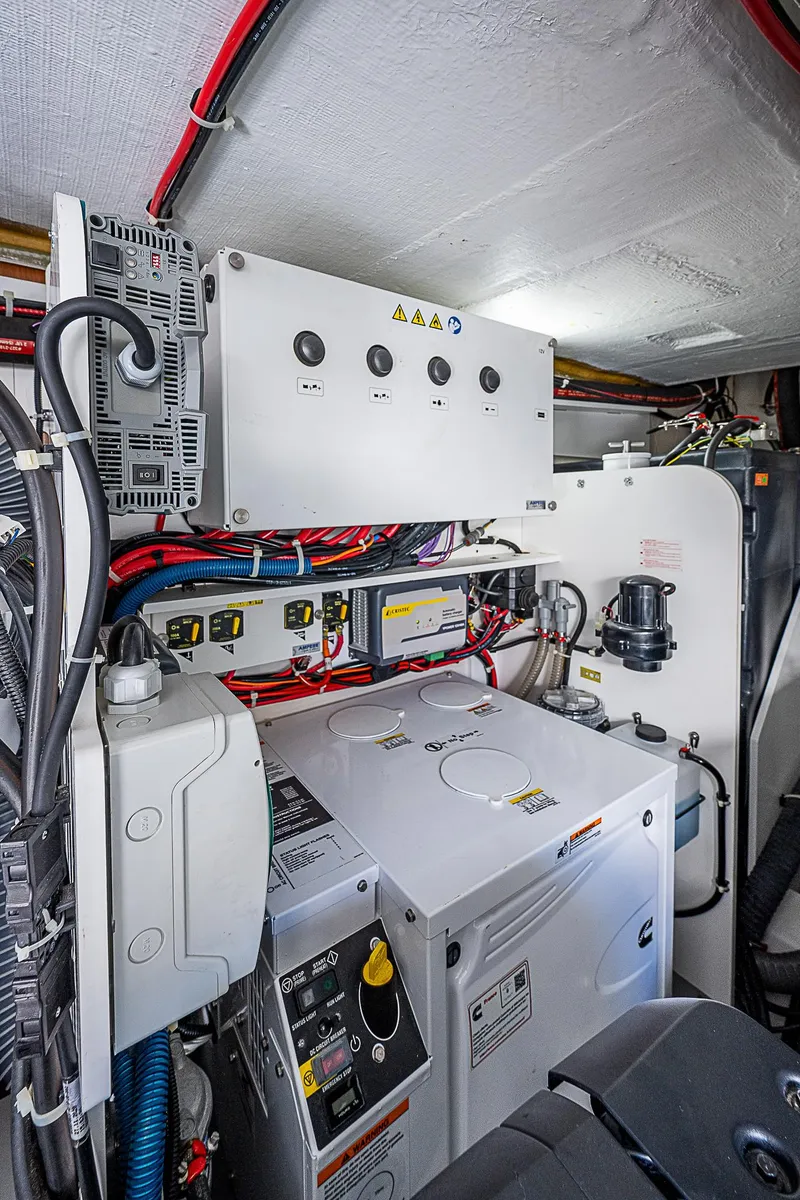 Slide: The Image of Engine room of 2022 Beneteau Gran Turismo 45 with electrical systems and wiring. - 28