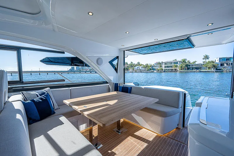 Slide: The Image of Luxurious interior of 2022 Beneteau Gran Turismo 45 yacht with waterfront view. - 36