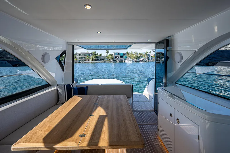 Slide: The Image of Interior of 2022 Beneteau Gran Turismo 45 yacht with waterfront view. - 37