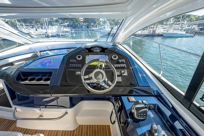 Slide: The Image of Interior view of 2022 Beneteau Gran Turismo 45 yacht cockpit with modern controls. - 40