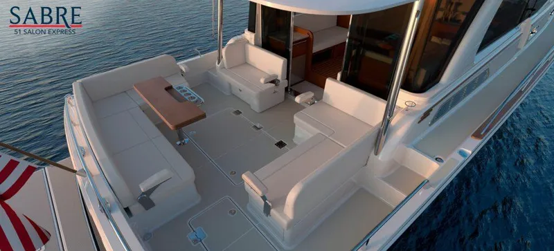 Slide: The Image of 2025 Sabre 51 Salon Express yacht with spacious deck and elegant seating. - 10