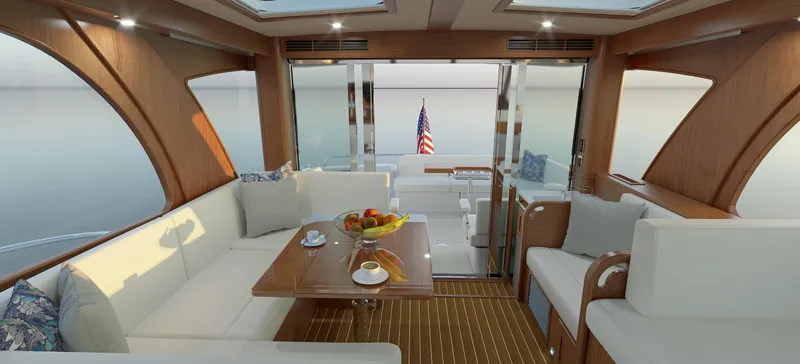 Slide: The Image of Luxurious interior of 2025 Sabre 51 Salon Express yacht with elegant seating and dining area. - 13
