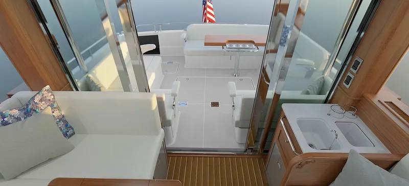 Slide: The Image of Interior of 2025 Sabre 51 Salon Express yacht, featuring elegant seating and modern design. - 14