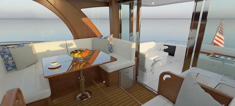 Slide: The Image of Interior of 2025 Sabre 51 Salon Express yacht with elegant seating and dining area. - 15