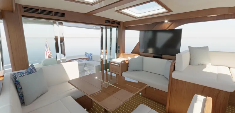 Slide: The Image of Luxurious interior of 2025 Sabre 51 Salon Express yacht with modern furnishings and large windows. - 16