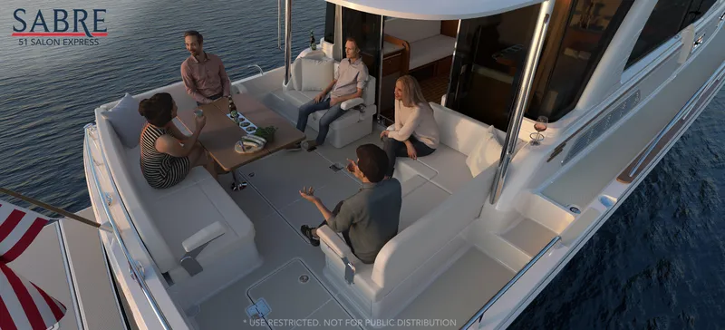 Slide: The Image of People relaxing on the deck of a 2025 Sabre 51 Salon Express yacht. - 7