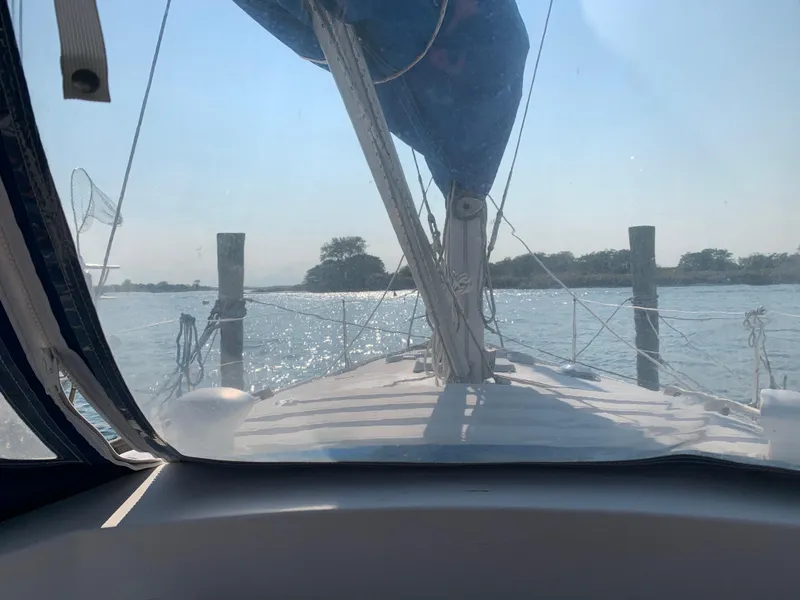 Slide: The Image of View from 1985 Hunter Legend 40 sailboat cockpit, sailing on a sunny day. - 16