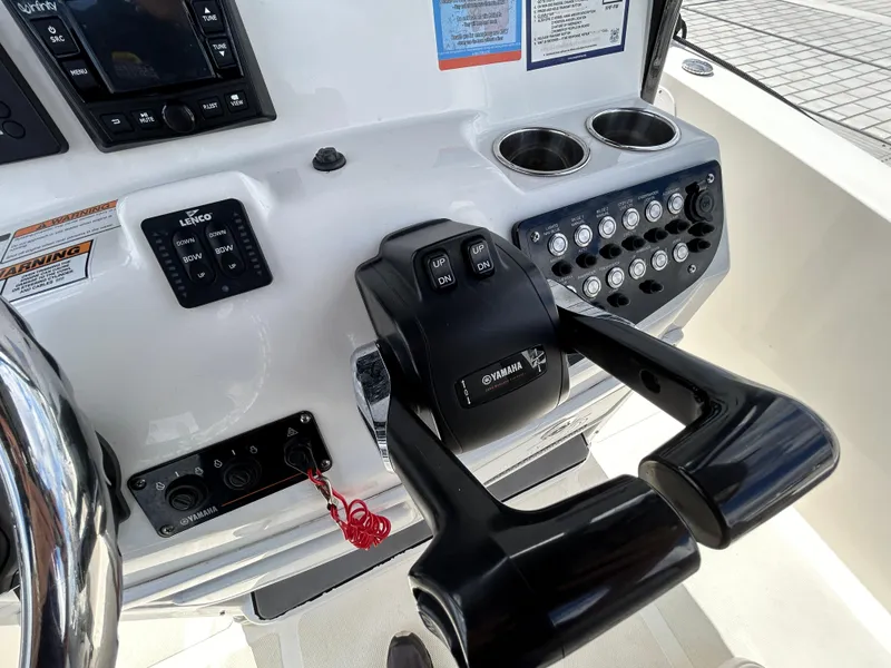 Slide: The Image of Control panel of 2021 NauticStar 2602 Legacy boat with Yamaha throttle. - 9