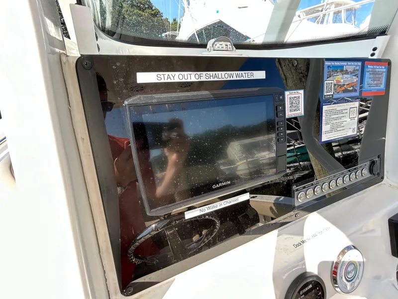 Slide: The Image of Dashboard of a 2021 Tidewater 232 LXF boat with Garmin navigation system. - 6