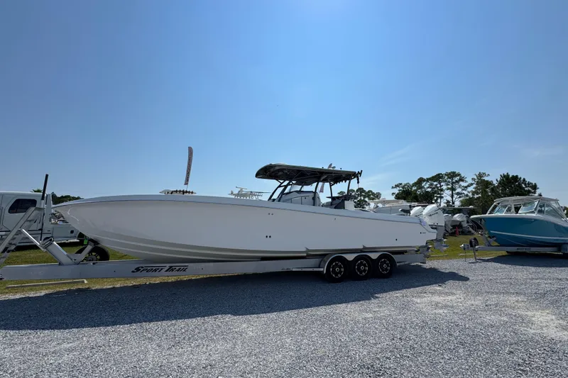 The Image of 2022 Nor-Tech 392 Super Fish boat on trailer under clear blue sky. - 0