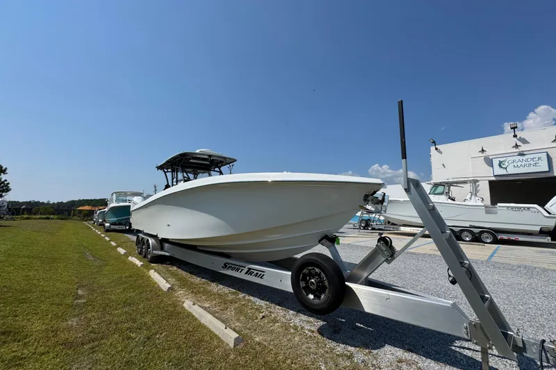 Slide: The Image of 2022 Nor-Tech 392 Super Fish boat on trailer at Grander Marine dealership. - 16